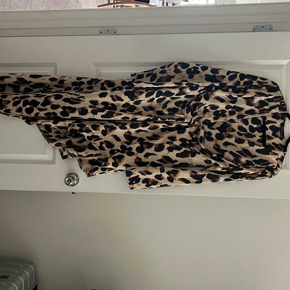 Pretty little thing size size US 12 leopard asymmetrical dress 100% polyester